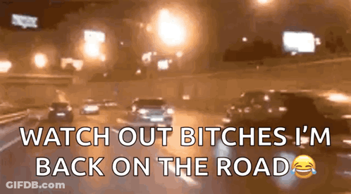 A Blurred Image Of Cars On A Highway With The Words Watch Out Bitches I 'M Back On The Road GIF