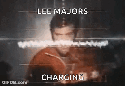 A Blurred Image Of Lee Majors Charging GIF