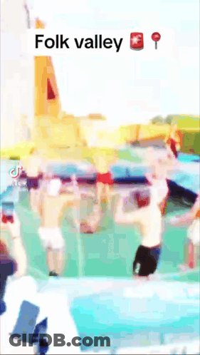 A Blurred Image Of People In A Pool With The Words Folk Valley At The Bottom GIF