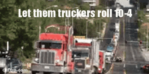A Blurred Image Of Trucks On A Highway With The Words Let Them Truckers Roll 10-4 GIF