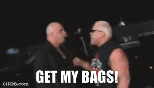 A Blurred Image Of Two Men With The Words " Get My Bags " On The Bottom GIF