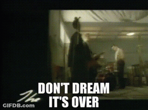A Blurred Image With The Words " Do N't Dream It 'S Over " GIF
