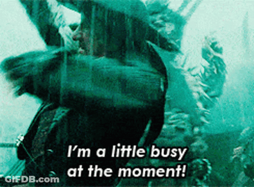 A Blurred Image With The Words I 'M A Little Busy At The Moment On It GIF