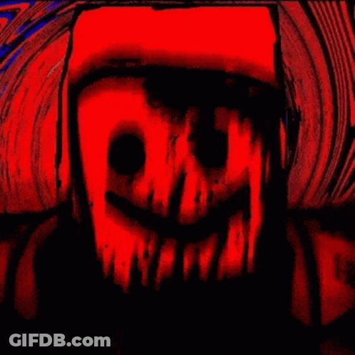 A Blurry Image Of A Person 'S Face With A Purple And Green Glow GIF