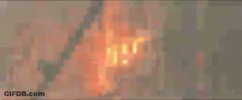 A Blurry Image Of A Person 'S Feet With A Light Coming Out Of Them GIF