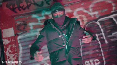 A Blurry Image Of A Person With A Red And Blue Stripe On Their Face GIF
