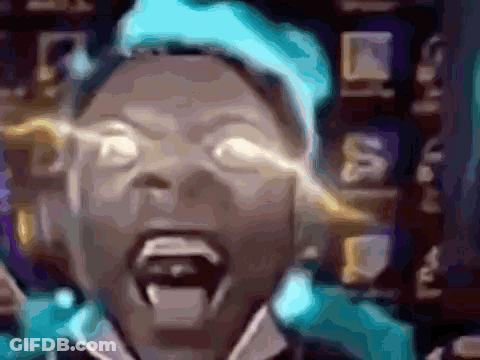 A Blurry Image Of A Person With Their Mouth Open GIF