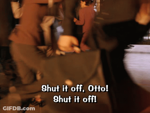 A Blurry Image Of People Walking With The Words Shut It Off Otto GIF
