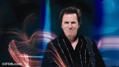 A Blurry Photo Of A Man In A Black Robe GIF