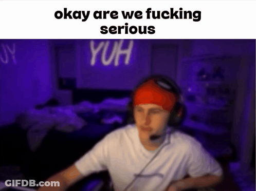 A Blurry Photo Of A Man With Headphones And The Words Okay Are We Fucking Serious GIF