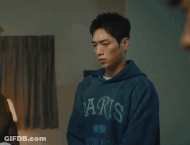 A Blurry Photo Of A Person Standing In A Room GIF