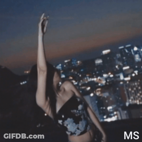 A Blurry Photo Of A Woman With The Letters Ms Visible GIF