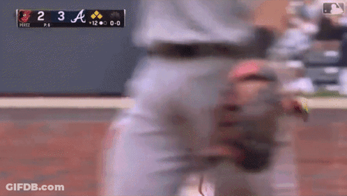 A Blurry Picture Of A Baseball Game Between The Pirates And The A's GIF