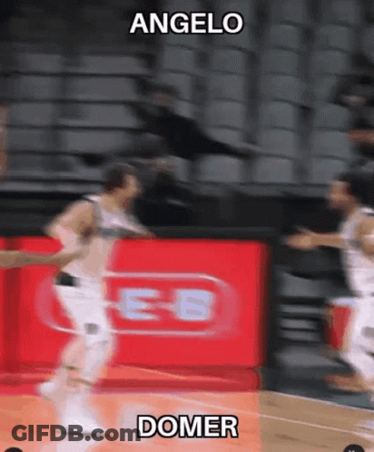 A Blurry Picture Of A Basketball Game With The Words Angelo And Domer GIF