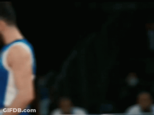 A Blurry Picture Of A Basketball Player Wearing A Blue And White Jersey With The Number 1 On It GIF
