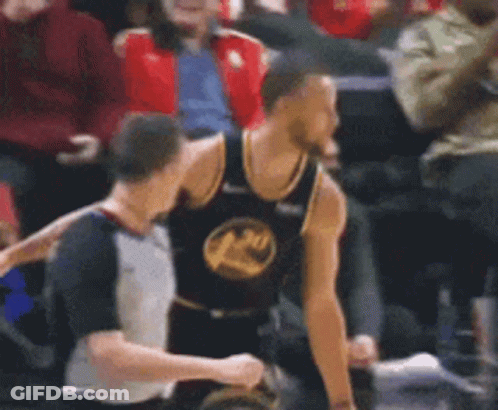 A Blurry Picture Of A Basketball Player Wearing A Golden State Warriors Jersey . GIF