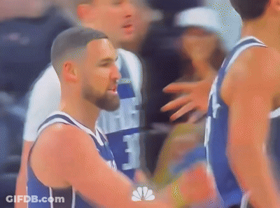 A Blurry Picture Of A Basketball Player Wearing A Number 3 Jersey GIF