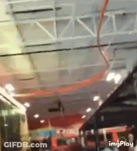 A Blurry Picture Of A Building With The Words Imgplay At The Bottom Right GIF