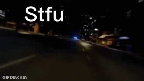 A Blurry Picture Of A Car With Stfu Written On It GIF