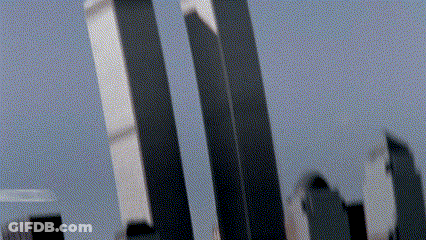 A Blurry Picture Of A City Skyline With A Few Tall Buildings In The Foreground GIF
