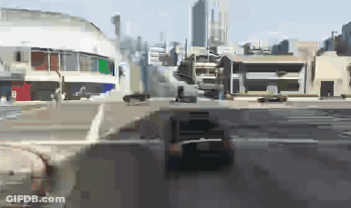A Blurry Picture Of A City With A Few Buildings GIF