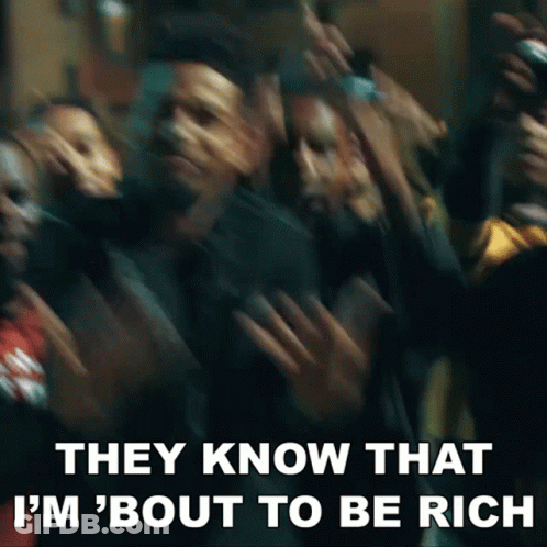 A Blurry Picture Of A Crowd Of People With The Words `` They Know That I 'M ' Bout To Be Rich '' . GIF