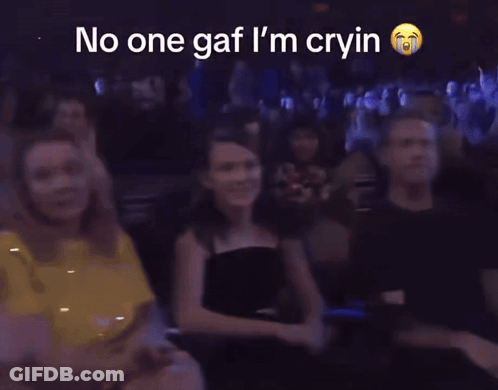 A Blurry Picture Of A Crowd With The Words No One Gaf I 'M Cryin GIF