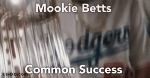 A Blurry Picture Of A Dodgers Jersey With The Words Mookie Betts Common Success GIF