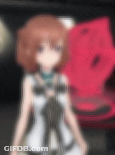 A Blurry Picture Of A Girl Standing In Front Of A Red Object GIF