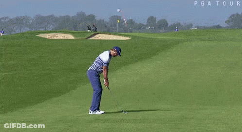 A Blurry Picture Of A Golf Course With The Word Pga Tour On The Bottom Right GIF