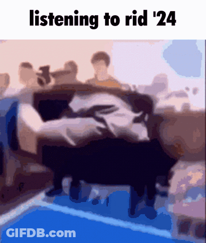 A Blurry Picture Of A Group Of People With The Caption Listening To Rid '24 ' GIF