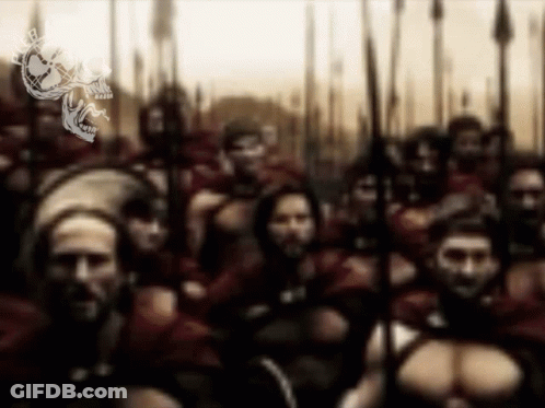 A Blurry Picture Of A Group Of Soldiers With A Skull On The Bottom Left GIF