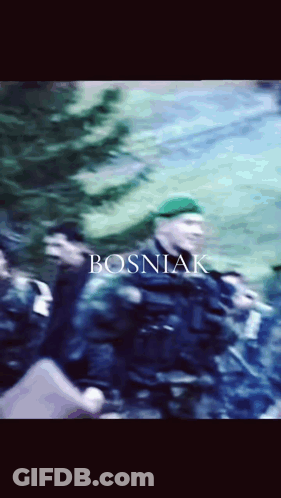 A Blurry Picture Of A Group Of Soldiers With Bosniak Written On The Bottom GIF