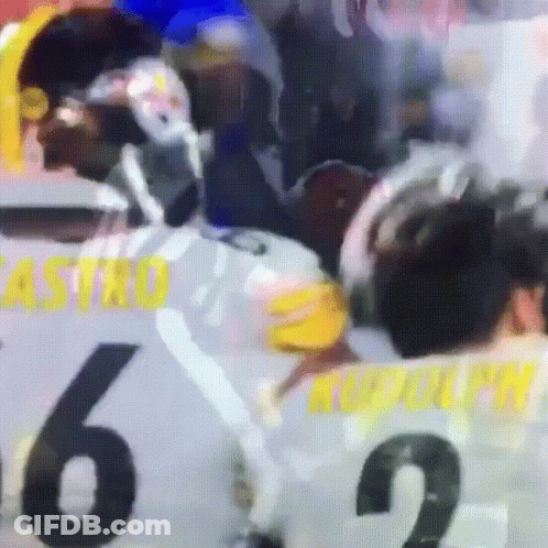 A Blurry Picture Of A Hockey Game With Castro 6 And Rudolph 2 GIF