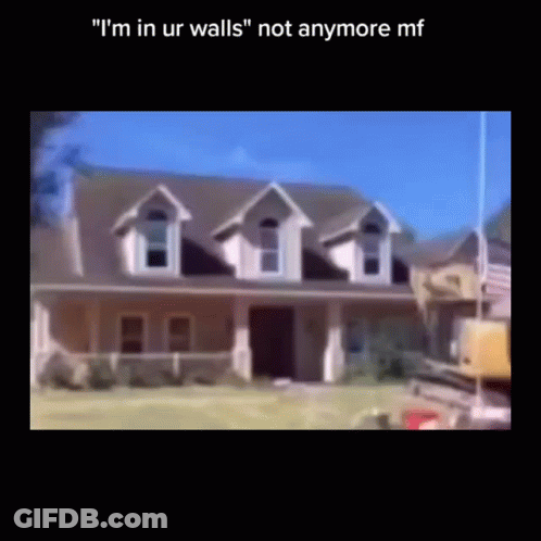 A Blurry Picture Of A House With The Words " I 'M In Ur Walls " On The Bottom GIF