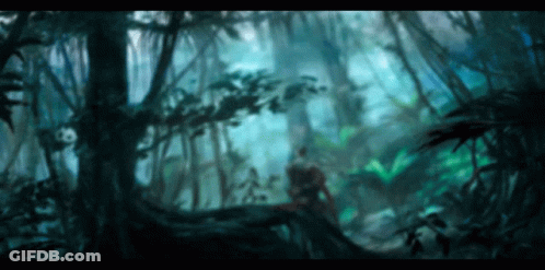 A Blurry Picture Of A Jungle With A Few Trees GIF