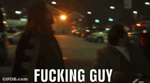 A Blurry Picture Of A Man And A Woman With The Words Fucking Guy Written On The Bottom GIF