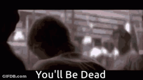 A Blurry Picture Of A Man And A Woman With The Words `` You 'Ll Be Dead '' Written In The Corner . GIF