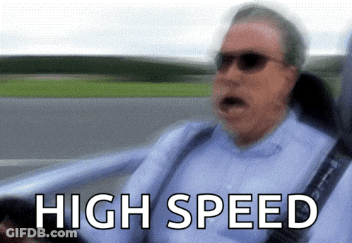 A Blurry Picture Of A Man Driving A Car With The Words High Speed Written Below Him GIF