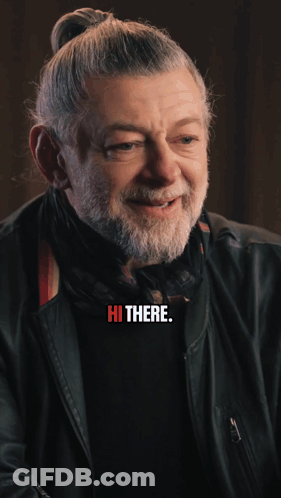 A Blurry Picture Of A Man Holding A Cell Phone With The Words " It 'S John Pork " Above Him GIF