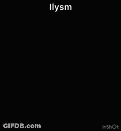 A Blurry Picture Of A Man Holding A Red Rose With The Word Illysm Written On The Bottom GIF