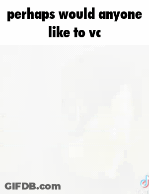 A Blurry Picture Of A Man In A Black Shirt With The Words `` Perhaps Would Anyone Like To Vc '' . GIF