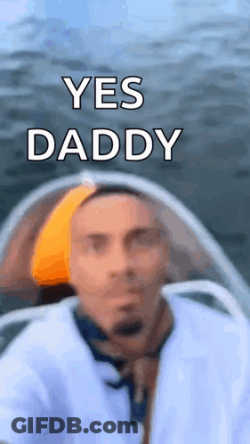Blurry Man In Boat With Yes Daddy Text GIF