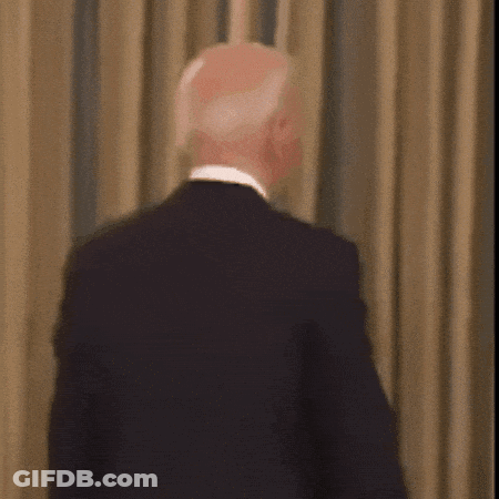 Blurry Man In Suit And Tie GIF