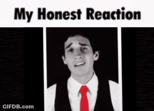A Blurry Picture Of A Man In A Suit And Tie With The Caption My Honest Reaction . GIF