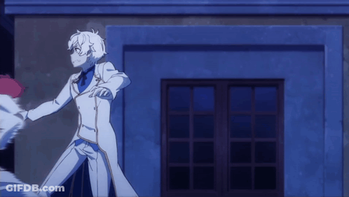 A Blurry Picture Of A Man In A White Coat Holding Another Man GIF