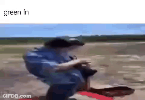 A Blurry Picture Of A Man Riding A Scooter On A Dirt Road . GIF