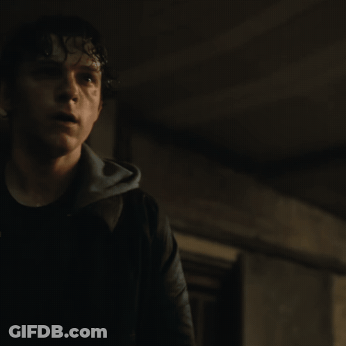 A Blurry Picture Of A Man 'S Face With A Blue Background GIF