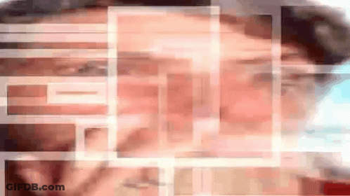 A Blurry Picture Of A Man 'S Face With A Grid Of Squares Surrounding It GIF