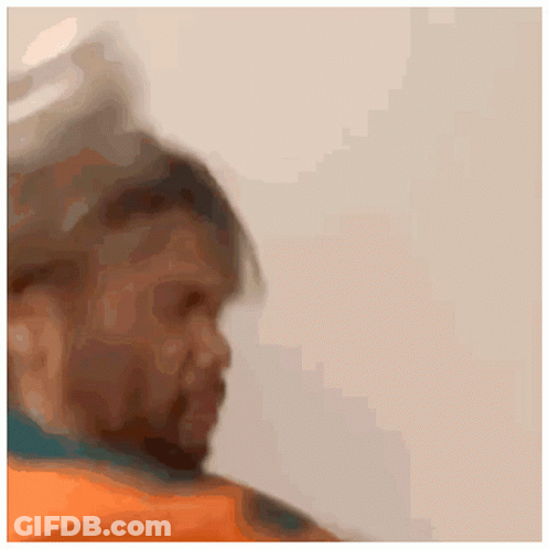 A Blurry Picture Of A Man 'S Face With A White Background GIF